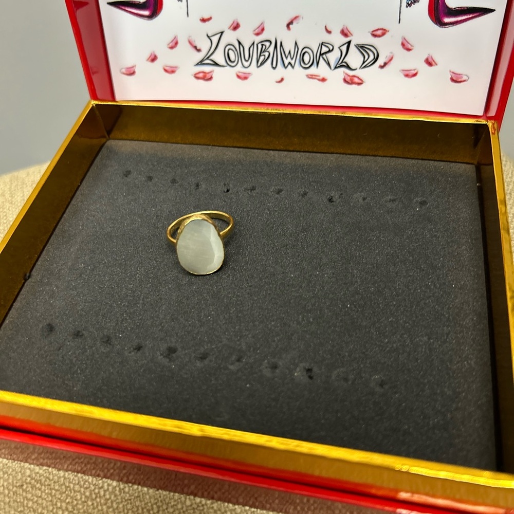 Gold-Plated Ring with Pale Green Teardrop Stone -